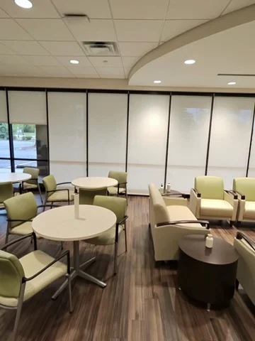 Tables and chairs in a clean commercial lounge